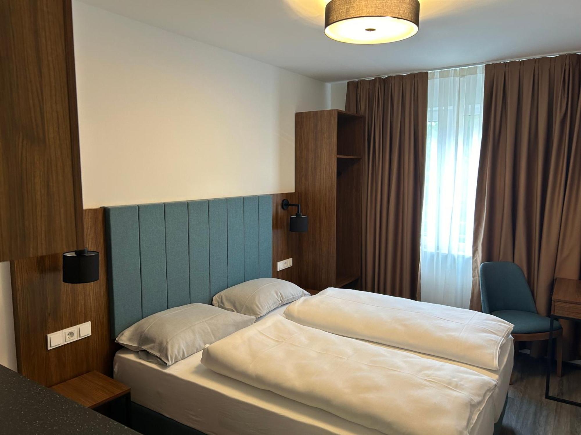 Munique Hotel Muenchen Унтершляйсгайм Екстер'єр фото