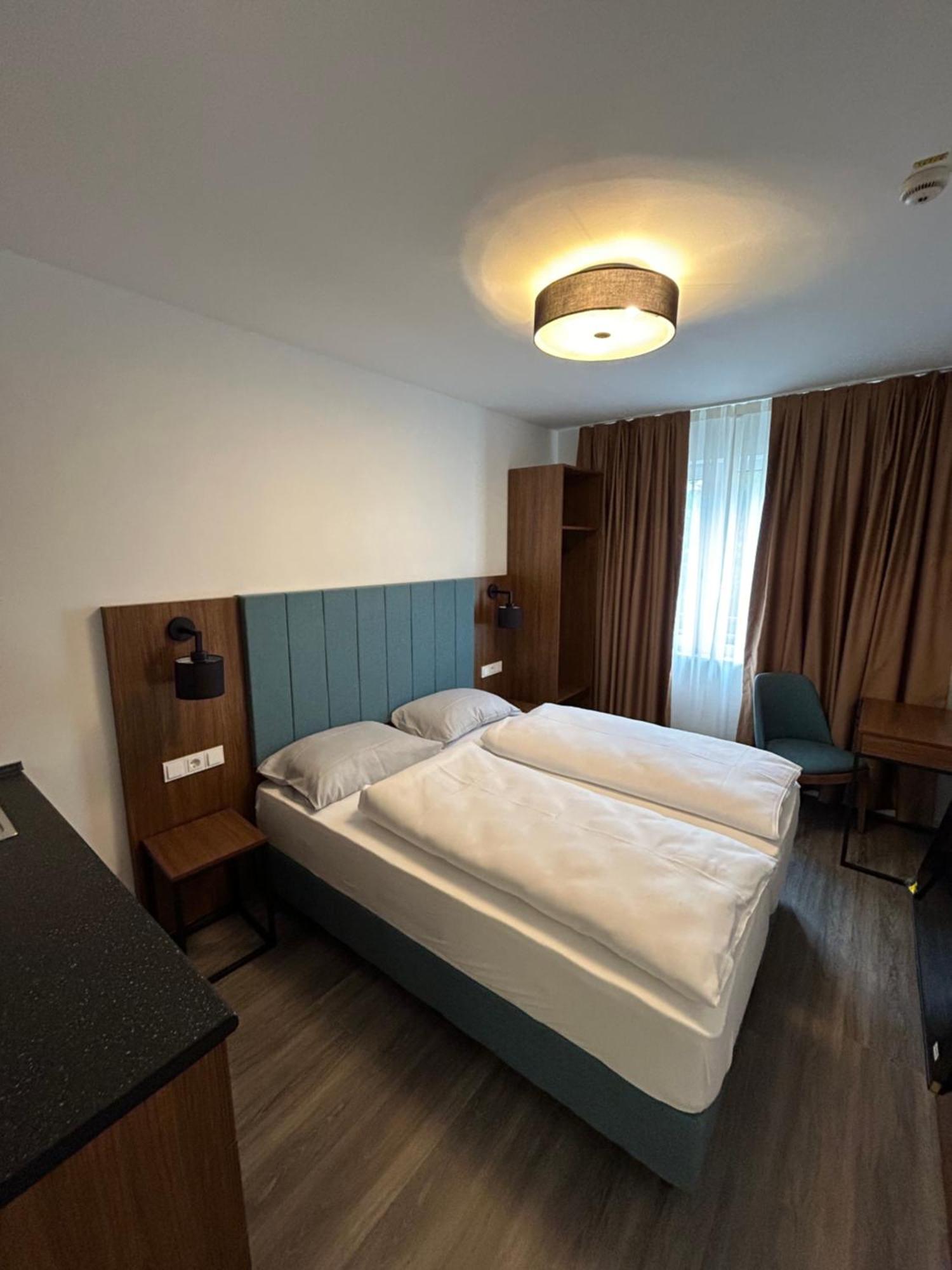 Munique Hotel Muenchen Унтершляйсгайм Екстер'єр фото